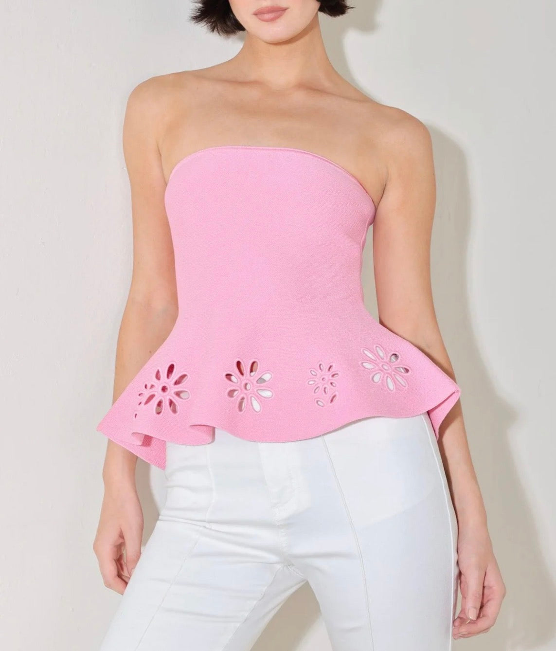 Rosette peplum top