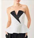 Marina Muse peplum top