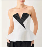 Marina Muse peplum top