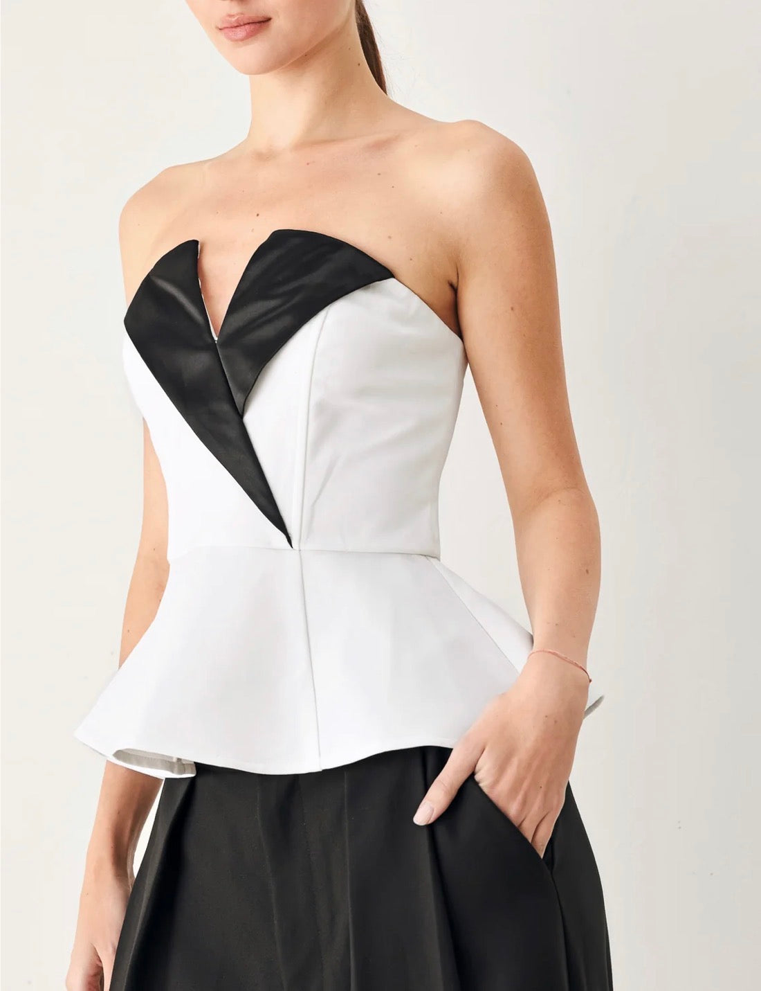 Marina Muse peplum top